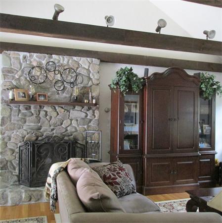 4 Raven Road Canton, MA 02021 - Photo 10 of 26 a living room with furniture and a fireplace