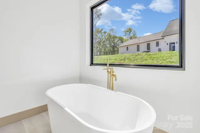 $797,000 | 27 Baxter Woods Lane, Candler, NC 28715