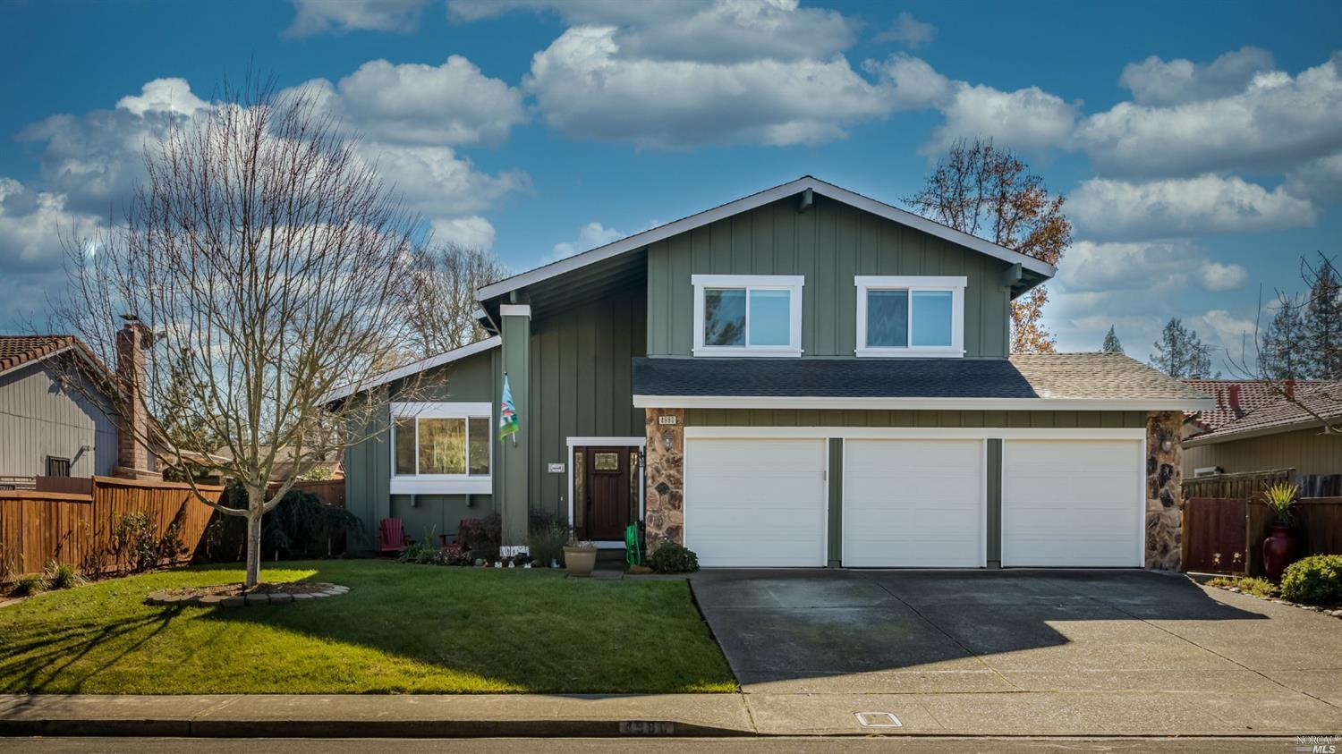 4980 Fern Place Rohnert Park, CA 94928 - Photo 1 of 1 a front view of a house with garden