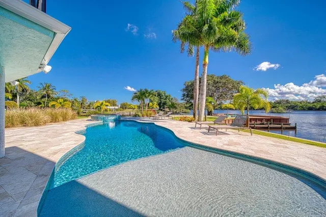a large white kitchen with lots of counter space
