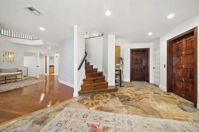 a view of a living room and a garage
