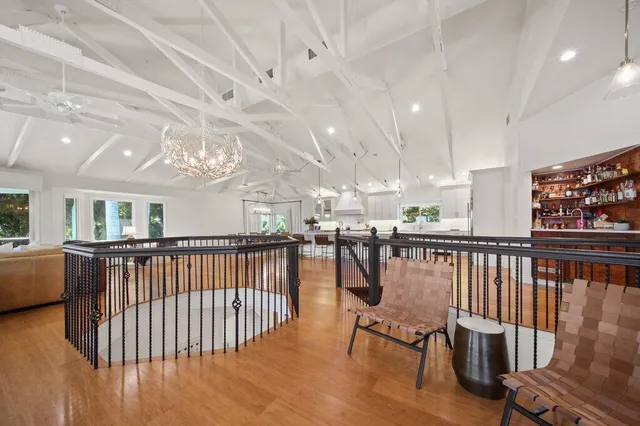 a view of a garden with a bench in the patio