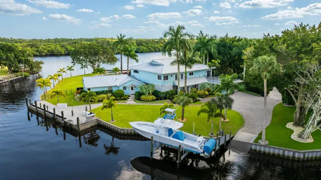 a view of a swimming pool with a lounge chairs
