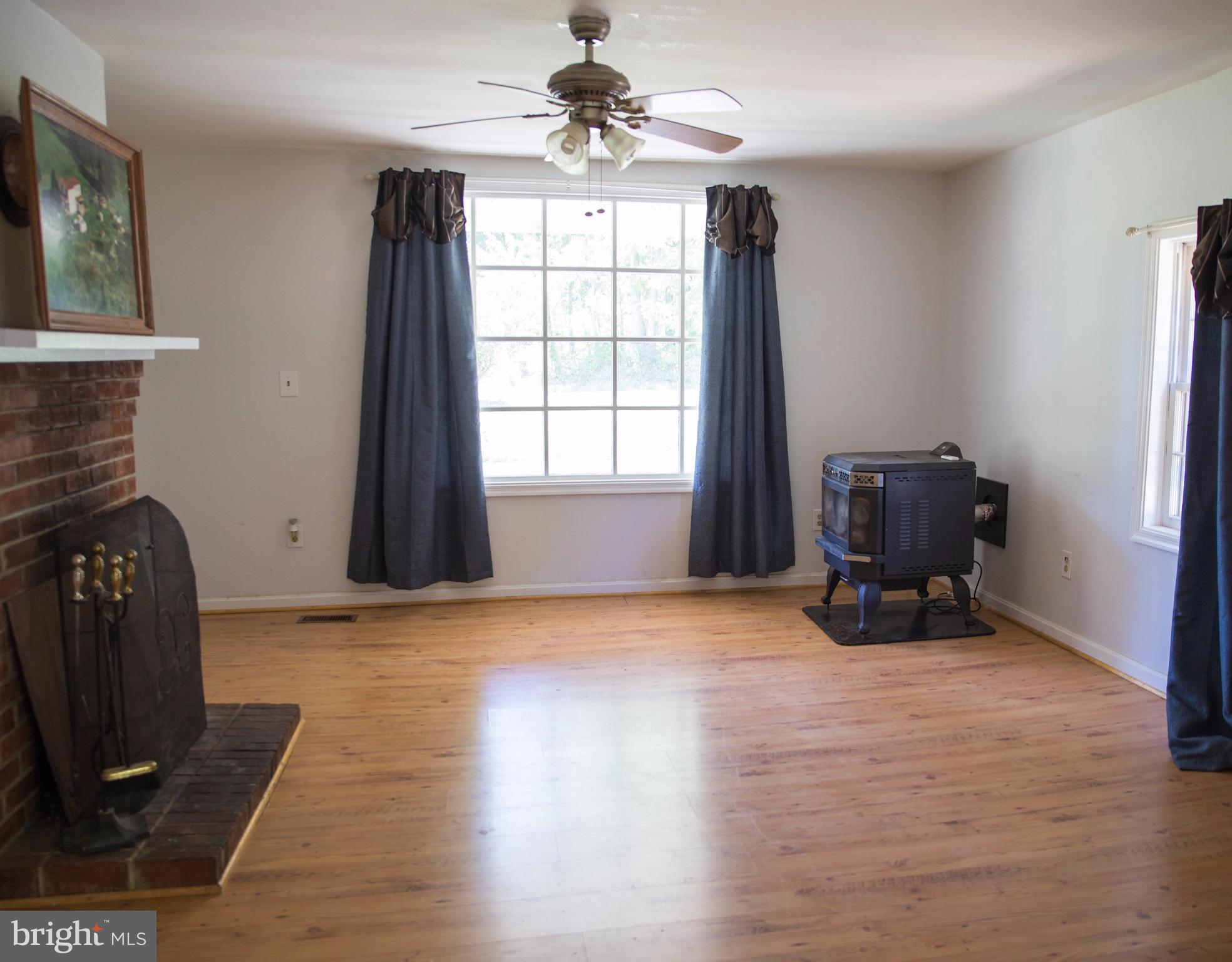 6498 Byrd Mill Road Louisa, VA 23093 - Photo 4 of 15 Newer pellet stove warms the home