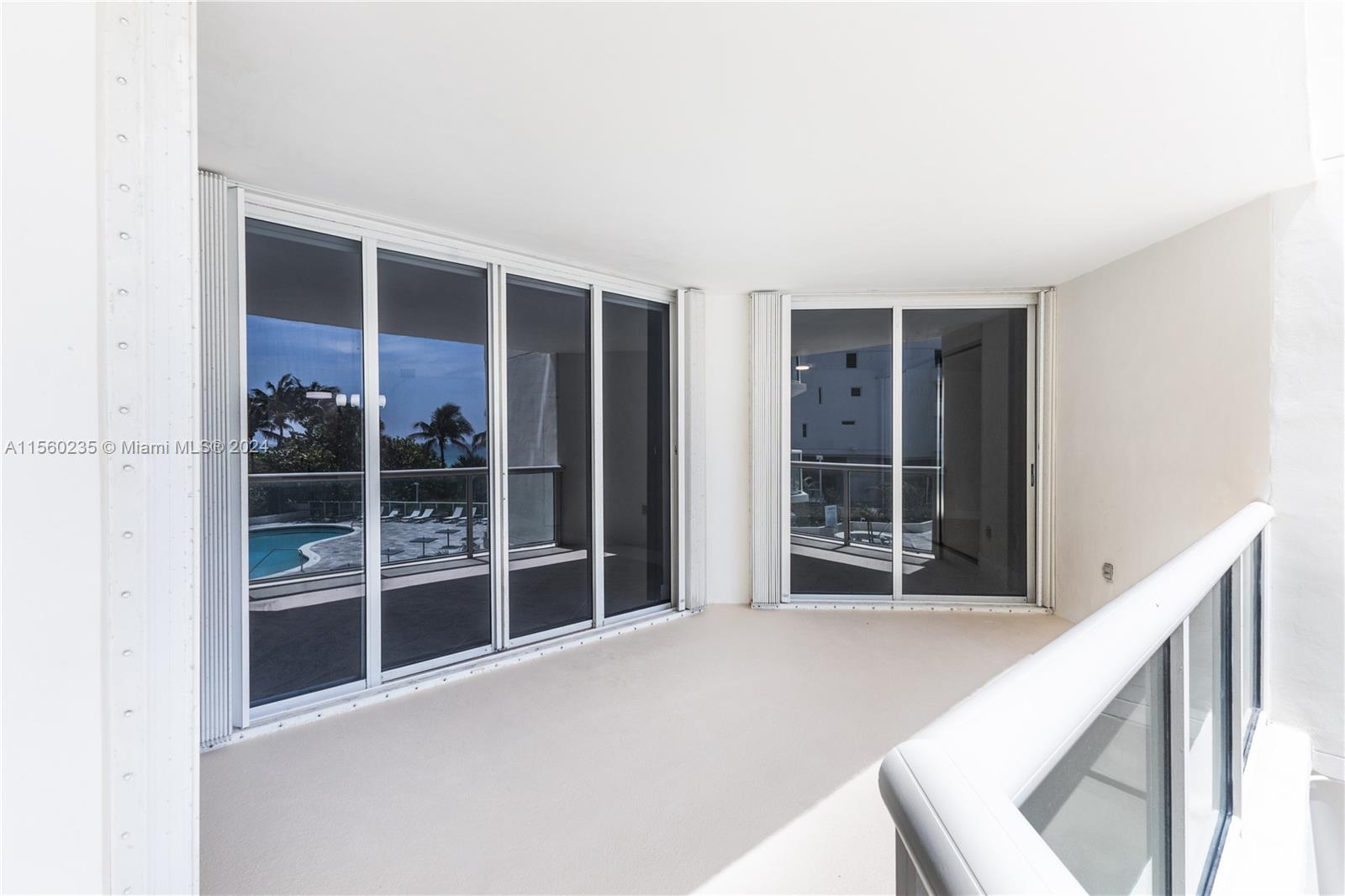 8925 Collins Avenue, Unit 2J Surfside, FL 33154 - Photo 21 of 62 a view of an empty room with a window
