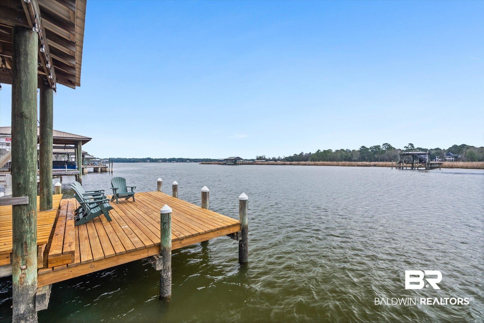 4851 Audubon Drive Mobile, AL 36619 - Photo 29 of 46 Dock featuring a water view and boat lift