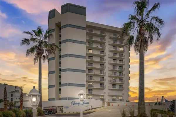 a street view with tall buildings