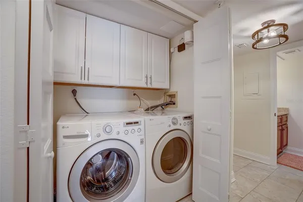 a bedroom with a bed and dresser