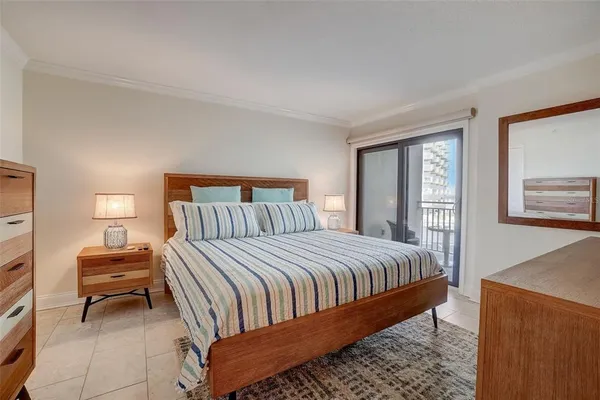 a bedroom with a bed and a cabinets