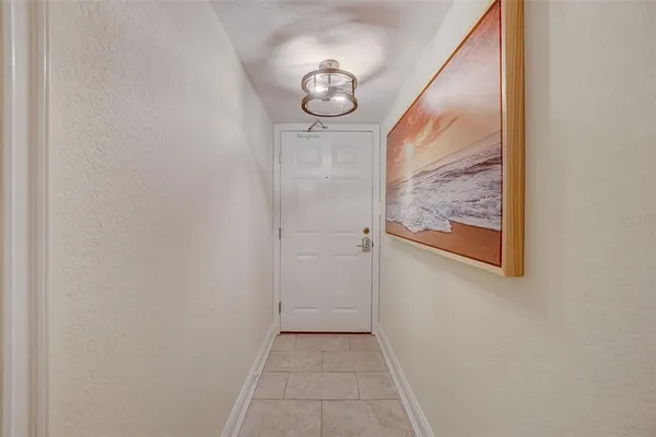a view of a hallway with entryway