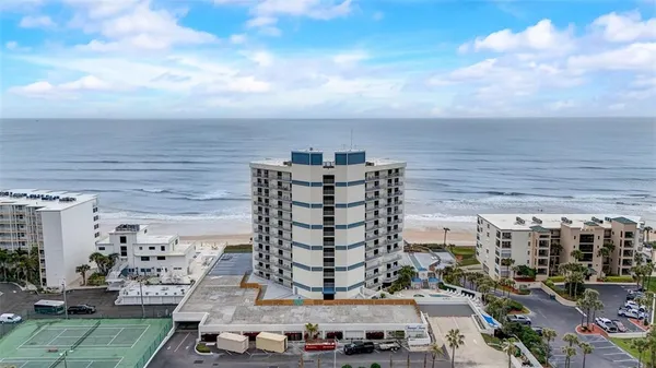 a view of a city with tall buildings