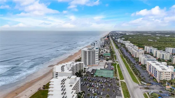a view of a city with tall buildings