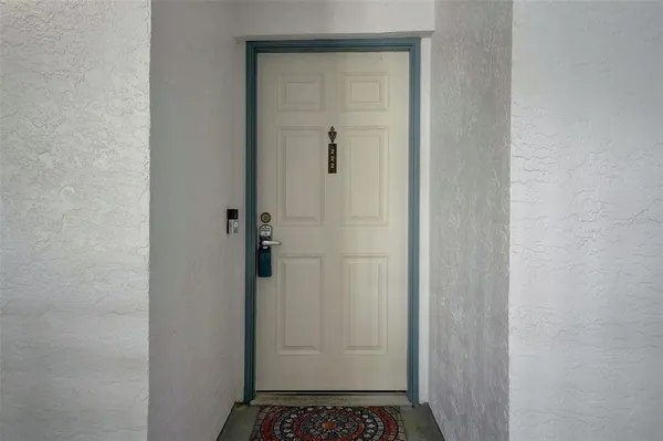 a picture of a wall with white wall painting