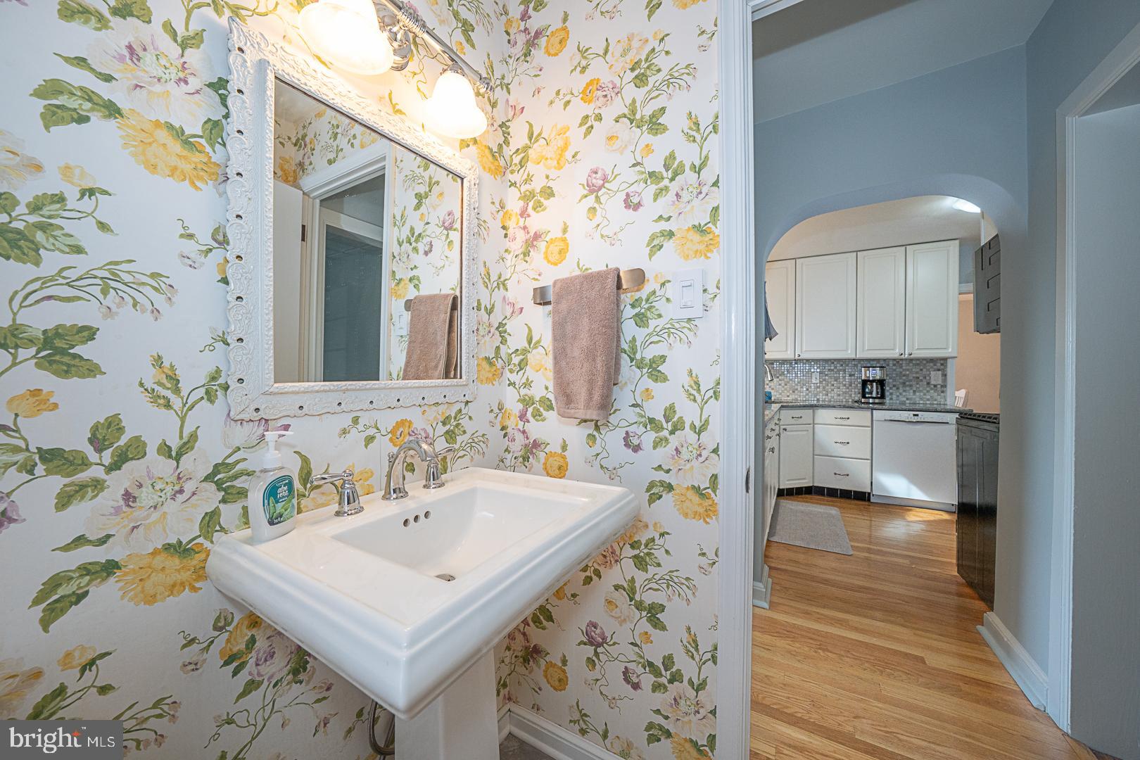 33 Rittenhouse Road Broomall, PA 19008 - Photo 12 of 47 a bathroom with a sink and a mirror