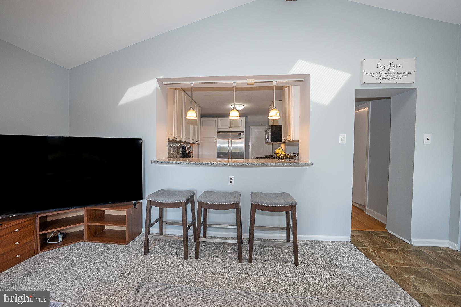 33 Rittenhouse Road Broomall, PA 19008 - Photo 21 of 47 a view of a livingroom with furniture and a flat screen tv