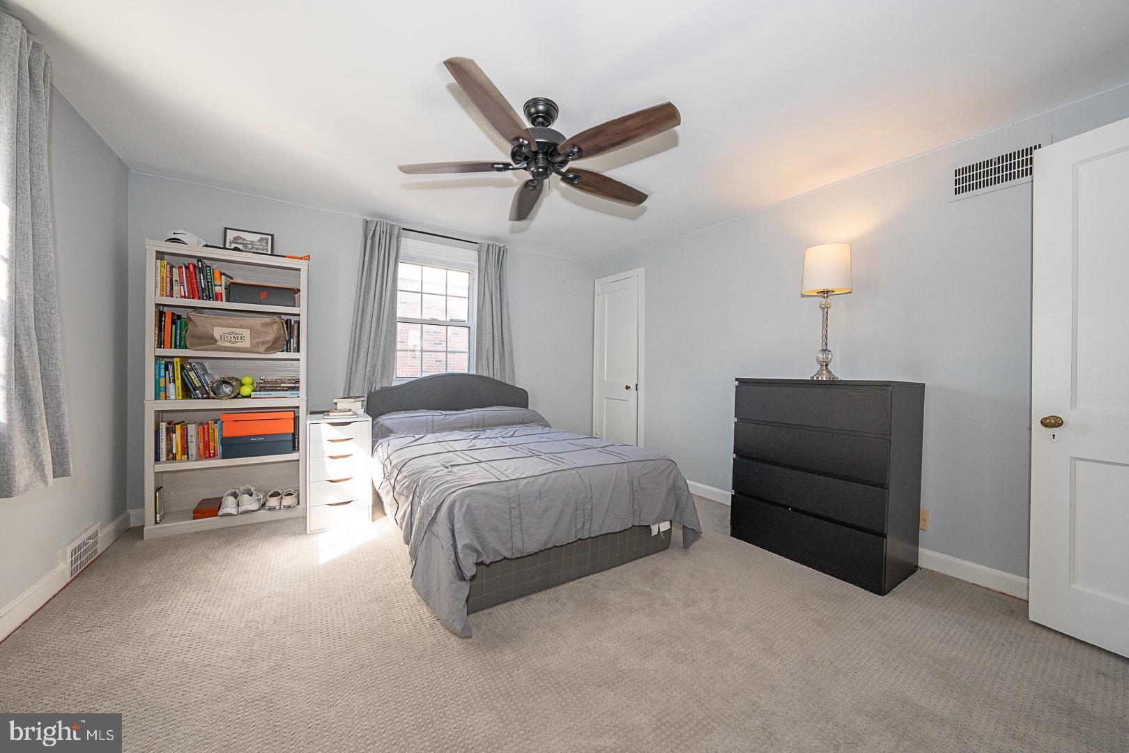 33 Rittenhouse Road Broomall, PA 19008 - Photo 29 of 47 a bedroom with a bed and a ceiling fan