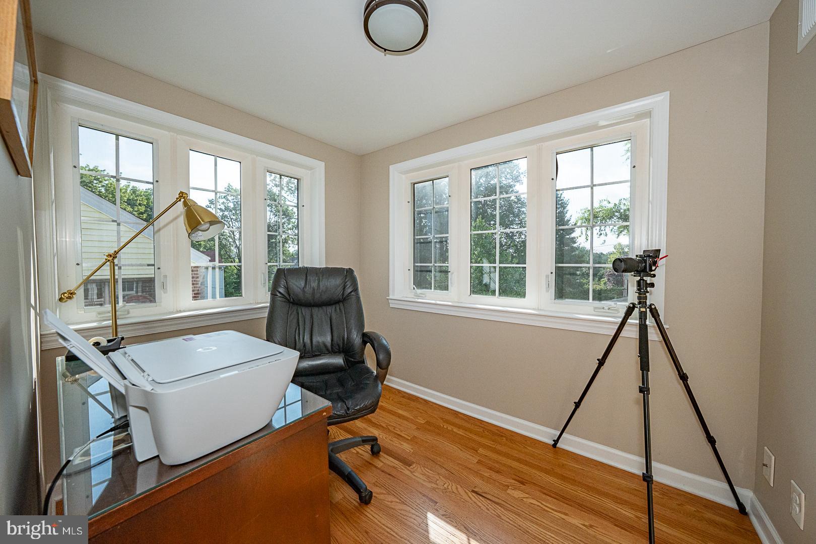 33 Rittenhouse Road Broomall, PA 19008 - Photo 32 of 47 a view of a workspace with furniture and a window