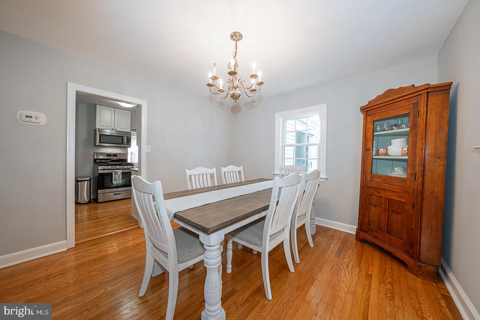 33 Rittenhouse Road Broomall, PA 19008 - Photo 8 of 47 a view of a dining room with furniture wooden floor and chandelier