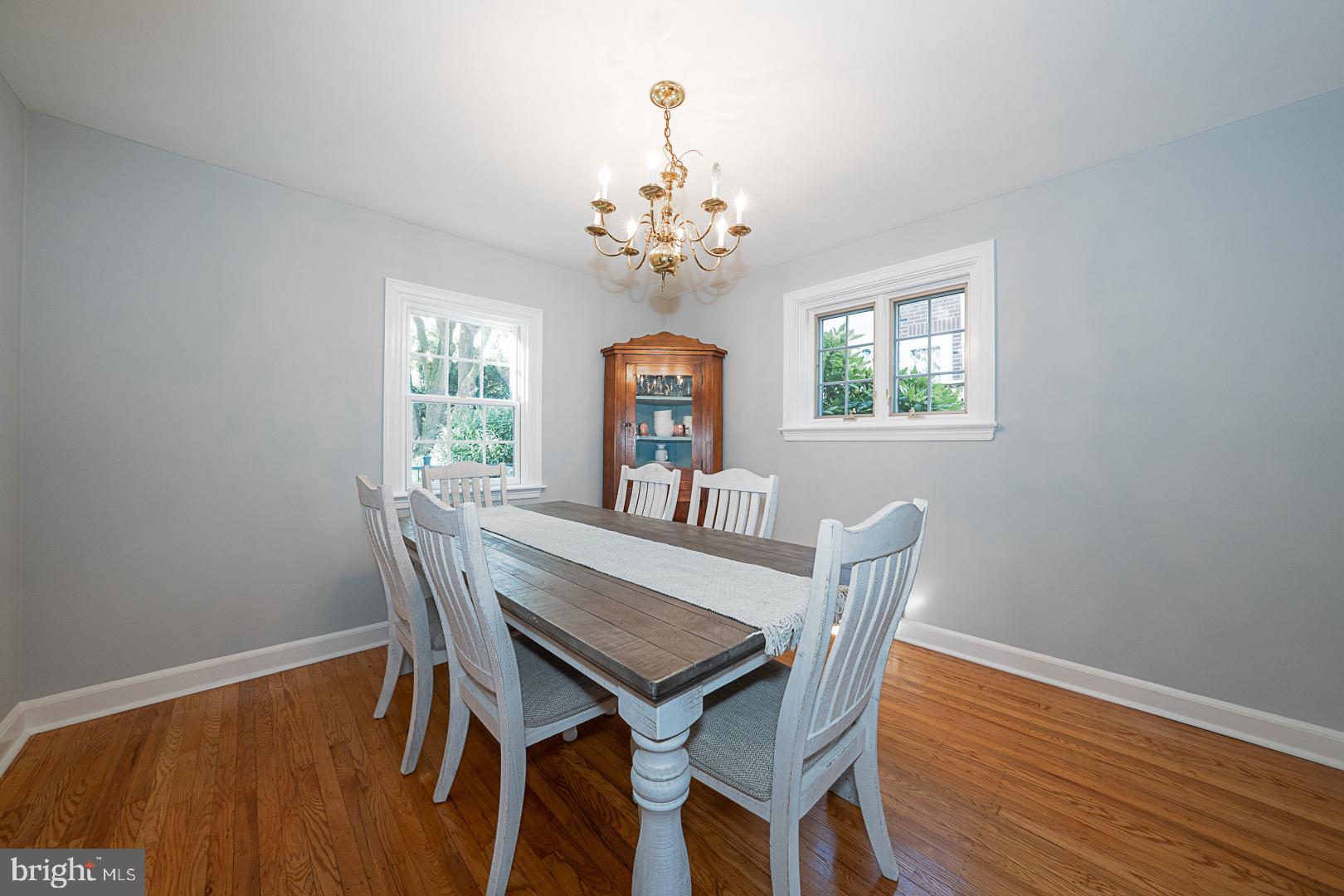 33 Rittenhouse Road Broomall, PA 19008 - Photo 9 of 47 a view of a dining room with furniture a chandelier and wooden floor