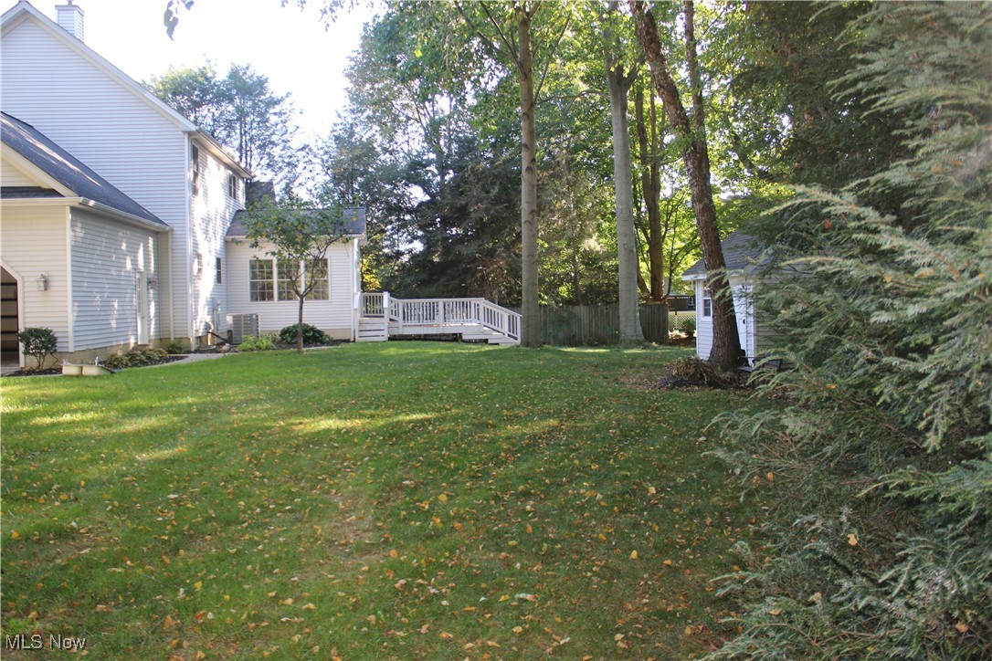 1837 Haines Road Madison, OH 44057 - Photo 26 of 29 View of yard with a wooden deck