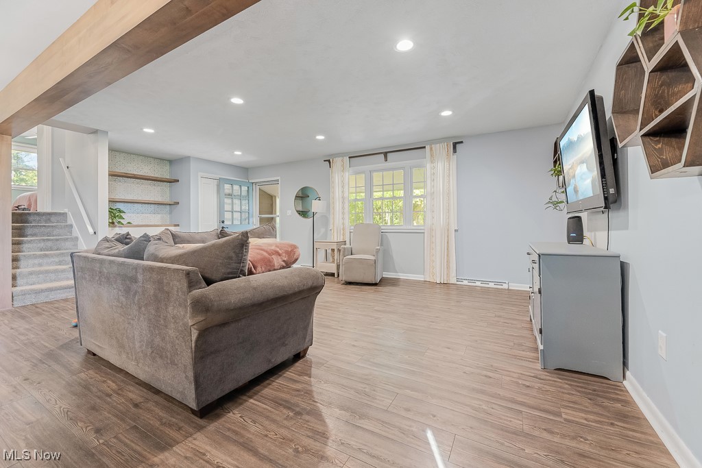 3166 Work Road Ravenna, OH 44266 - Photo 6 of 48 Living room with light wood-type flooring and baseboard heating