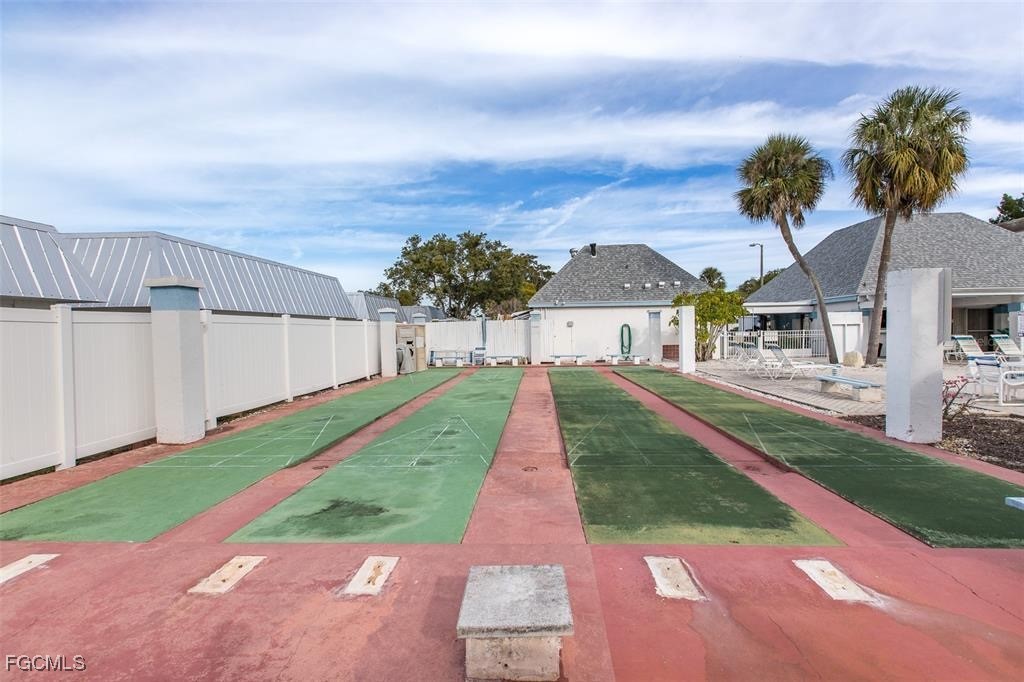 4232 Tamargo Drive New Port Richey, FL 34652 - Photo 18 of 20 a view of house with a big yard plants and large trees