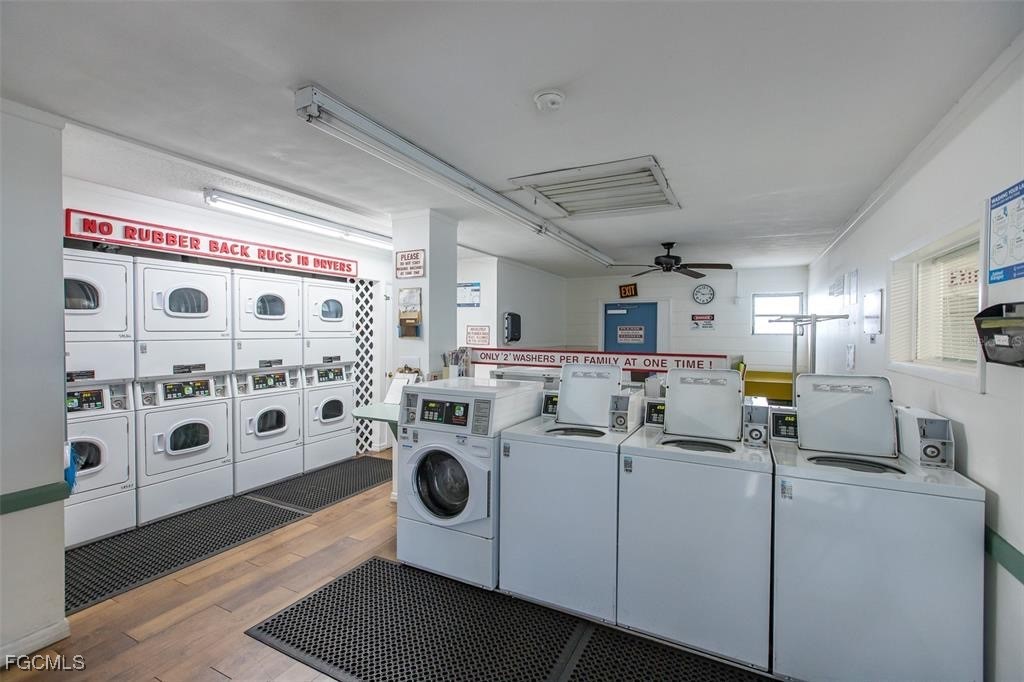 4232 Tamargo Drive New Port Richey, FL 34652 - Photo 19 of 20 a utility room with multiple dryer and washer