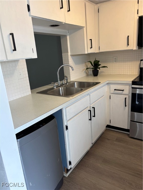 4232 Tamargo Drive New Port Richey, FL 34652 - Photo 2 of 20 a kitchen with sink and cabinets