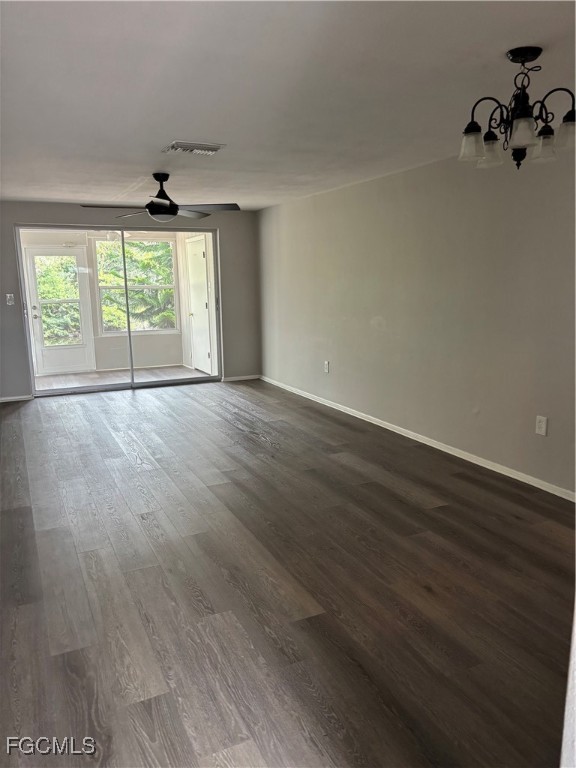 4232 Tamargo Drive New Port Richey, FL 34652 - Photo 5 of 20 wooden floor in an empty room with a window