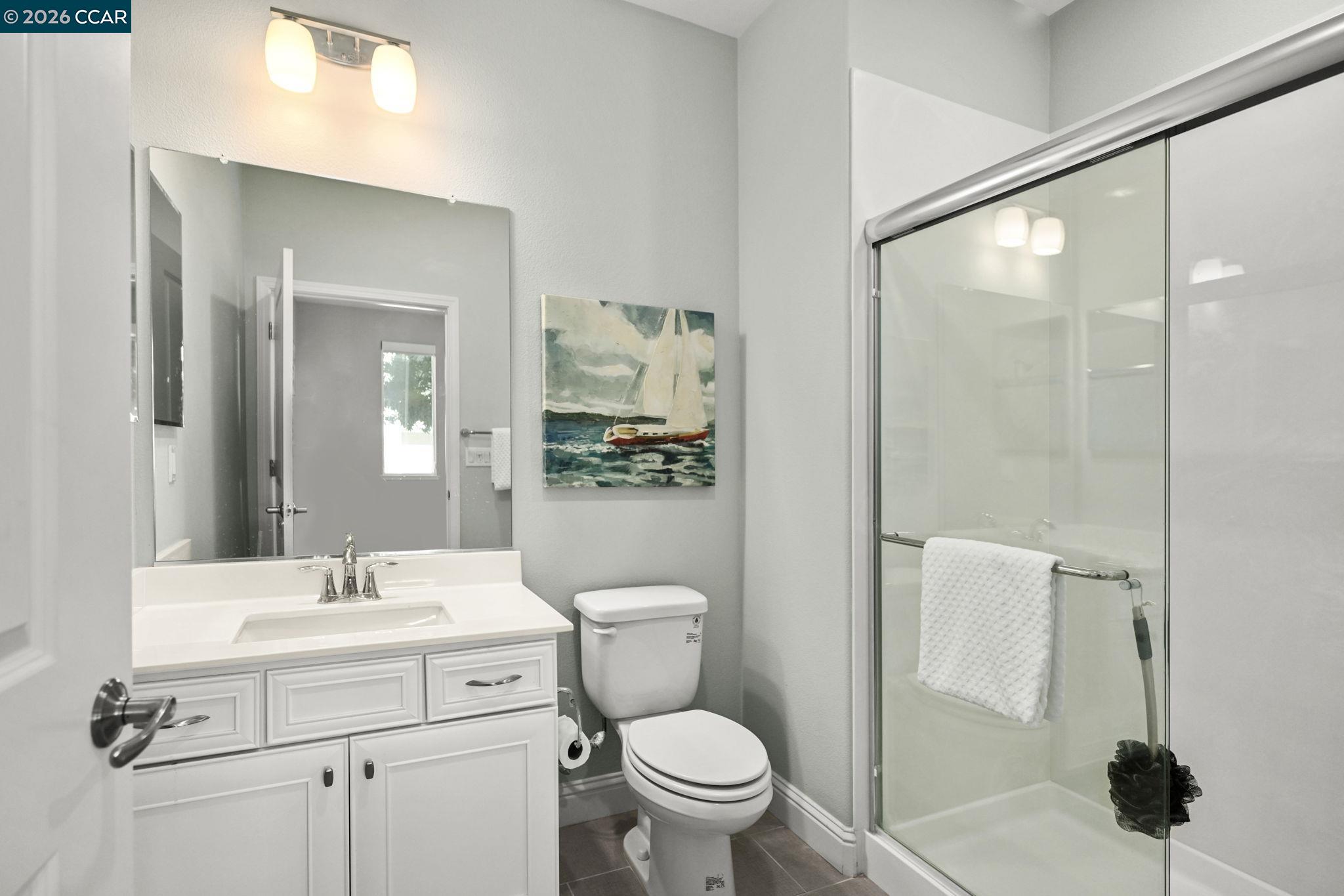3923 Meridian Street Dublin, CA 94568 - Photo 7 of 39 a bathroom with a sink toilet and shower