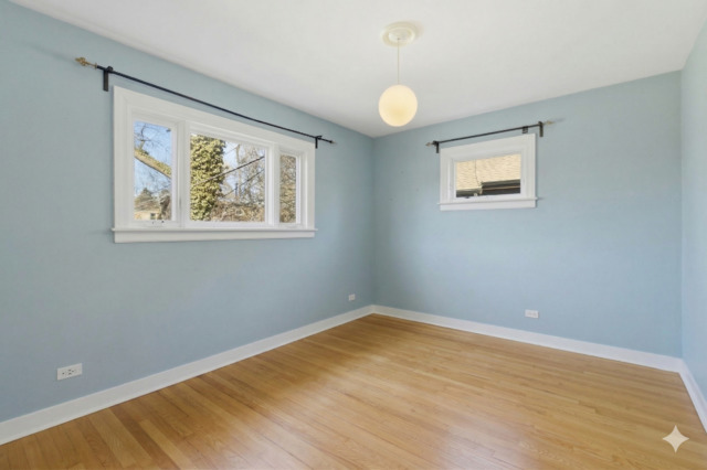 556 Barton Avenue, Unit 2 Evanston, IL 60202 - Photo 20 of 21 an empty room with a window