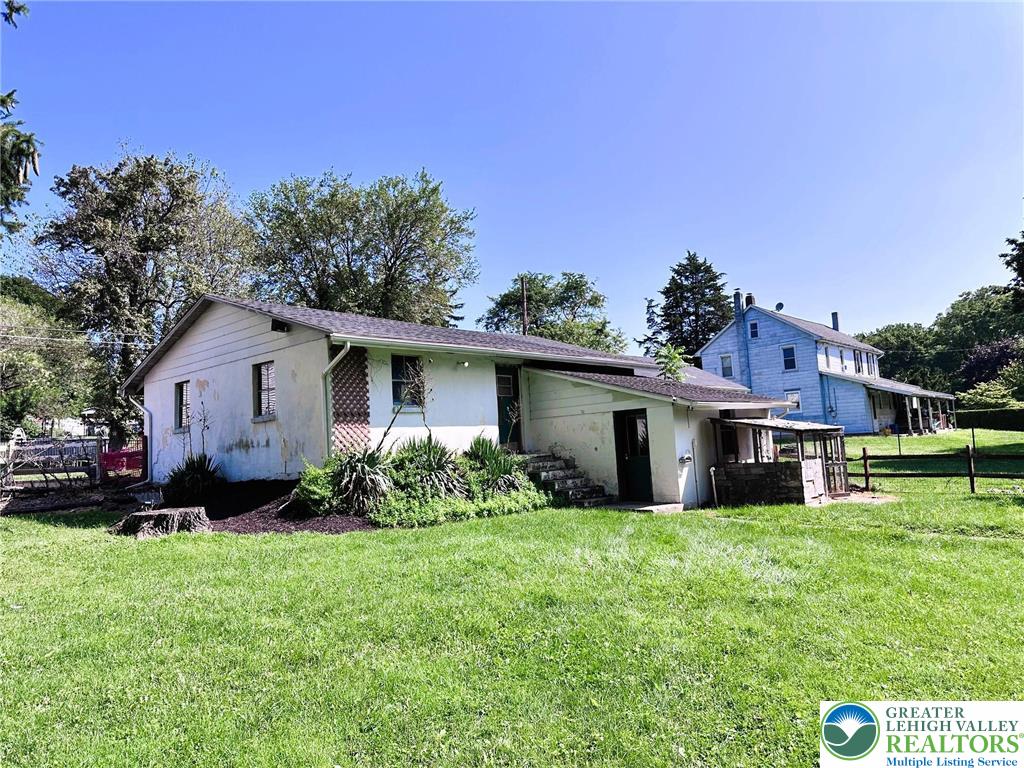 505 Penn Street Bath, PA 18014 - Photo 18 of 23 a front view of house with yard and green space