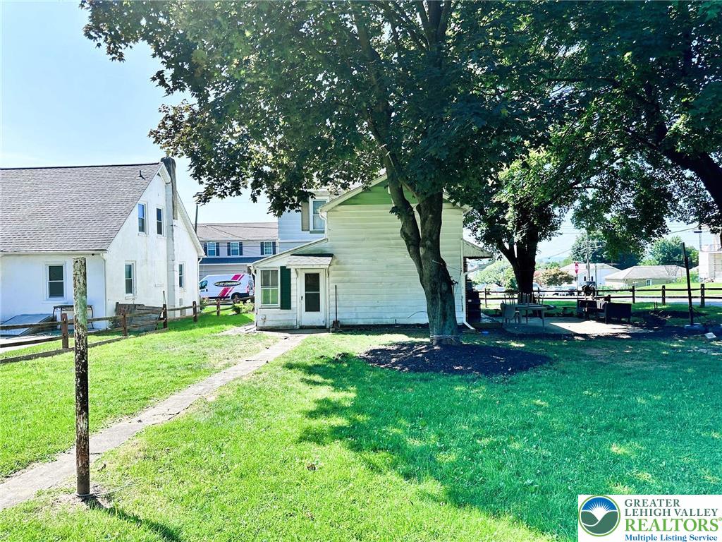 505 Penn Street Bath, PA 18014 - Photo 20 of 23 a front view of a house with garden