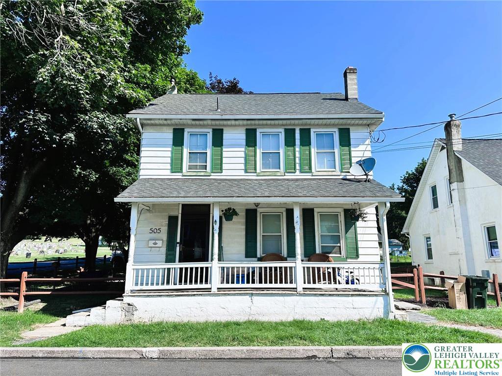 505 Penn Street Bath, PA 18014 - Photo 2 of 23 a front view of a house with a garden