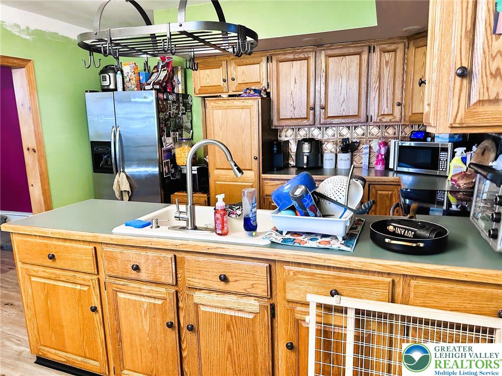 505 Penn Street Bath, PA 18014 - Photo 5 of 23 a kitchen with sink and a window