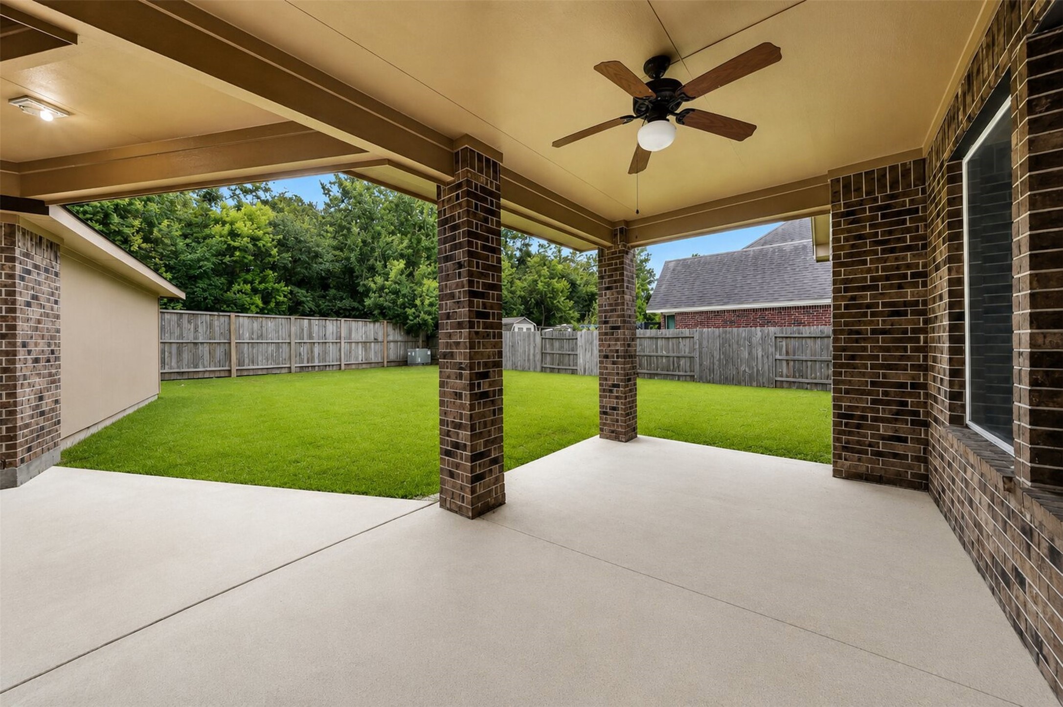 6234 Avon Landing Lane Spring, TX 77379 - Photo 37 of 49 As you step outdoors, you have this large covered patio, the perfect place to sit and unwind while you watch the children or your pets play outdoors.