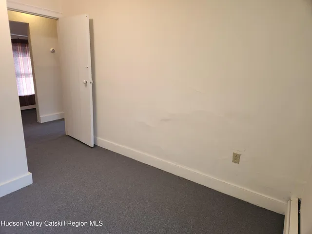a view of hallway with stairs