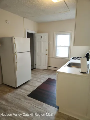a utility room with washer and dryer