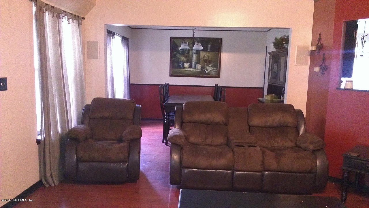 9129 Sable Ridge Court Jacksonville, FL 32244 - Photo 10 of 31 Great Room & Formal Dining