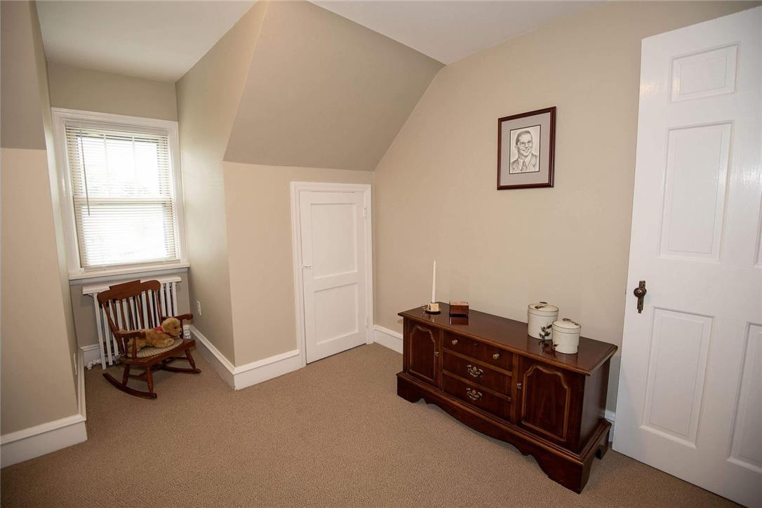 706 Stones Crossing Road Easton, PA 18045 - Photo 16 of 40 A cozy bedroom with sloped ceilings and plush berber carpeting provides a tranquil retreat.