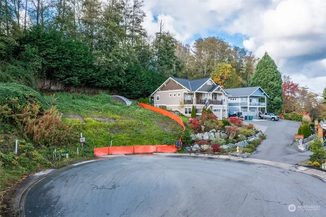 a view of balcony with wooden floor