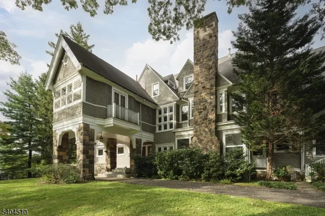 a view of a building with a yard