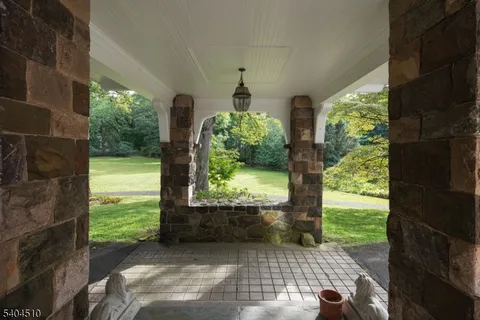 a view of porch with a yard