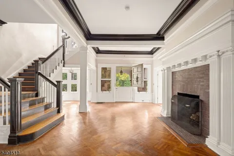 a view of an entryway with staircase