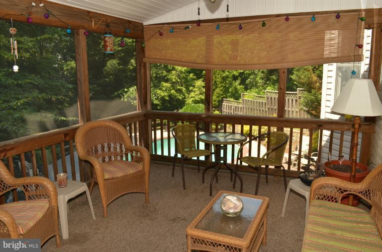 9215 Bretton Reef Road Baltimore, MD 21234 - Photo 8 of 25 Screened Porch Area Overlooking Hot Tub and Pool