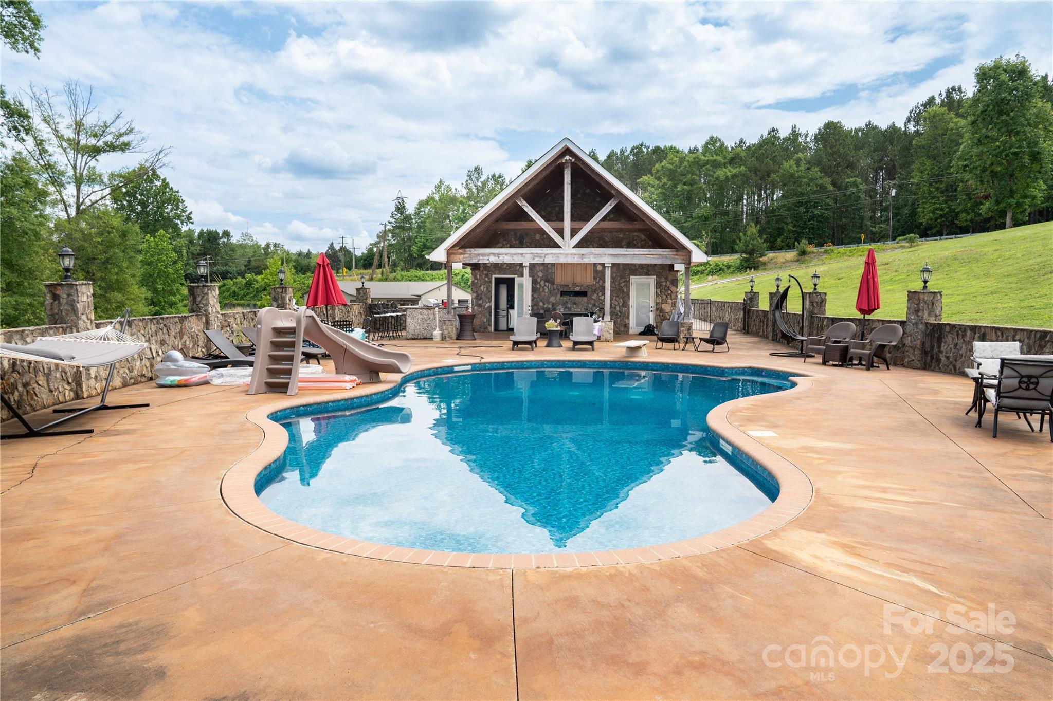 2650 Rainbow Lake Road Inman, SC 29349 - Photo 13 of 48 a view of a house with swimming pool and sitting area