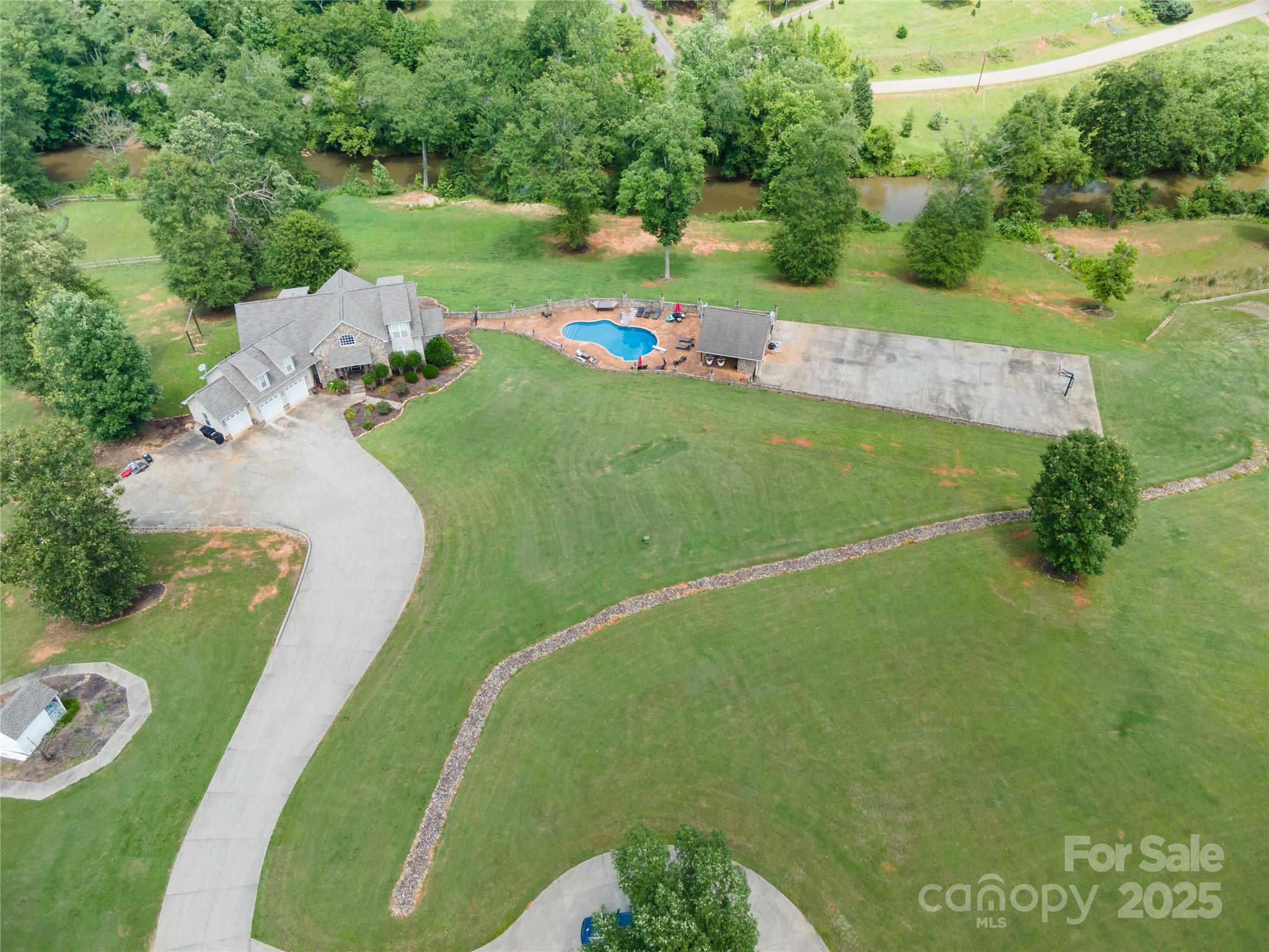 2650 Rainbow Lake Road Inman, SC 29349 - Photo 2 of 48 an aerial view of a golf course with a lake view