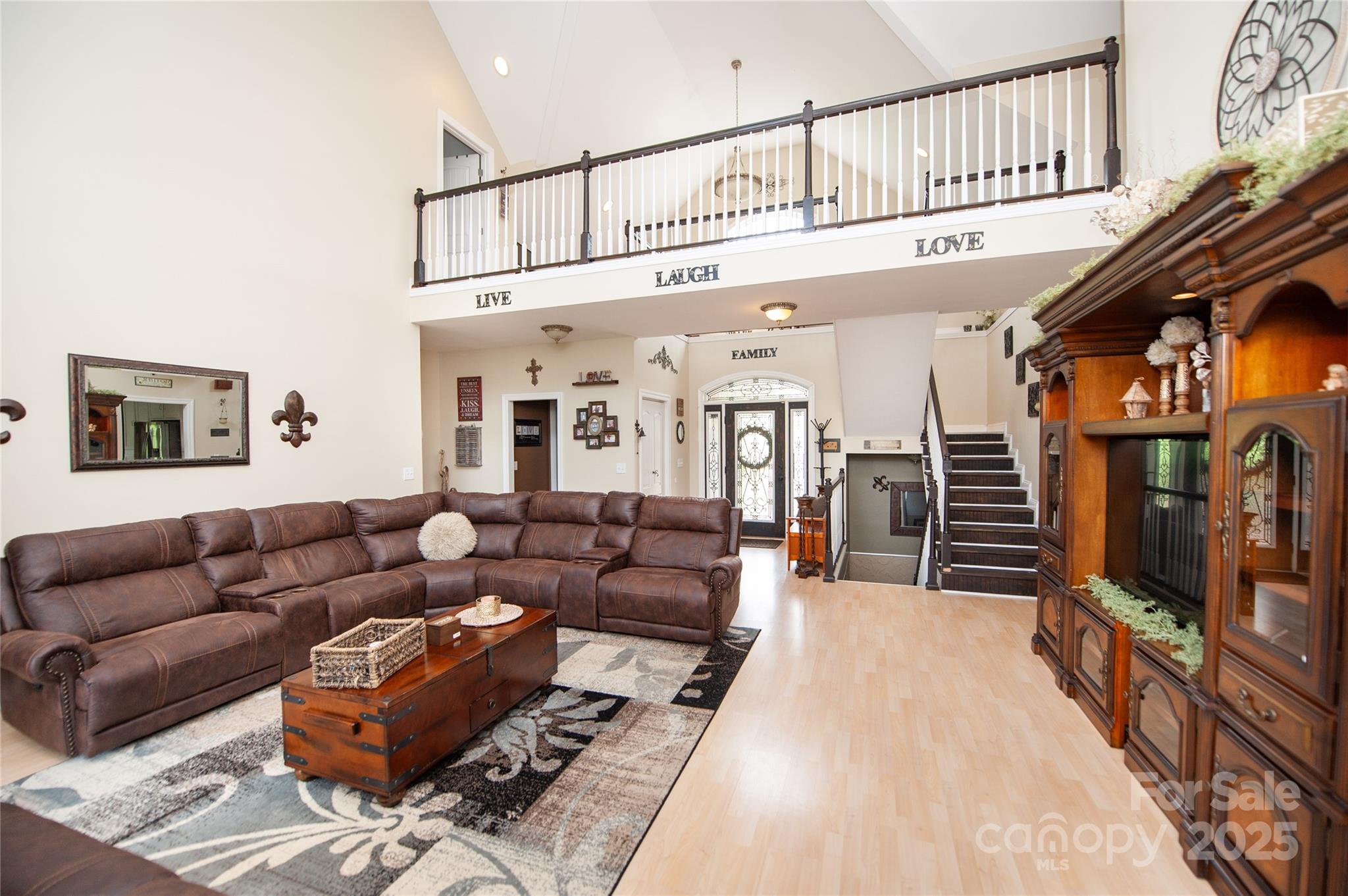 2650 Rainbow Lake Road Inman, SC 29349 - Photo 25 of 48 a living room with furniture a flat screen tv and a ceiling fan