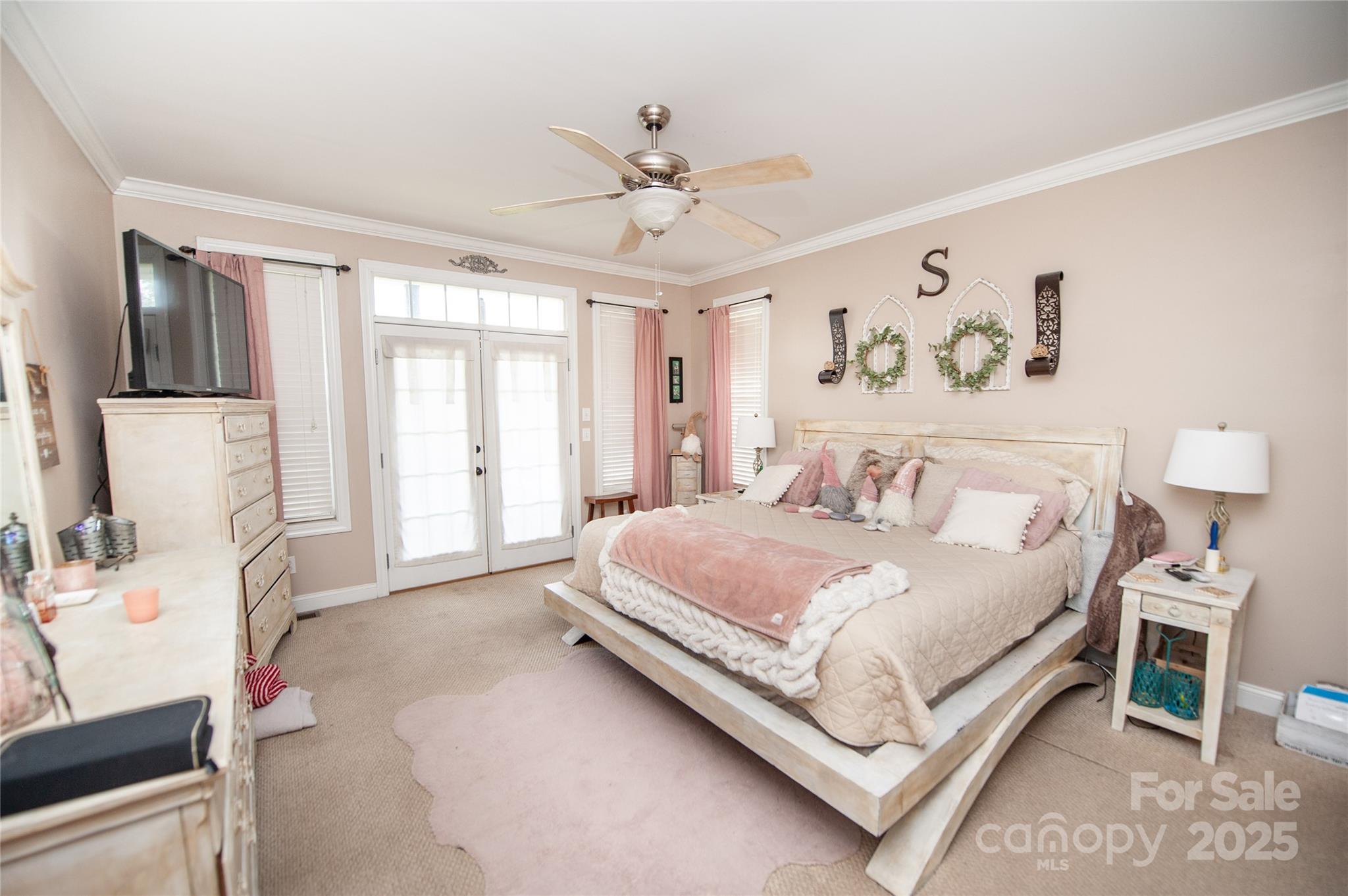 2650 Rainbow Lake Road Inman, SC 29349 - Photo 27 of 48 a spacious bedroom with a bed and a couch