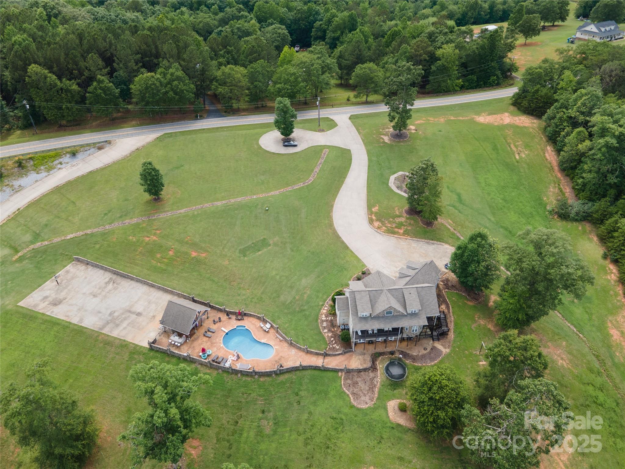 2650 Rainbow Lake Road Inman, SC 29349 - Photo 4 of 48 a view of a swimming pool and outdoor space